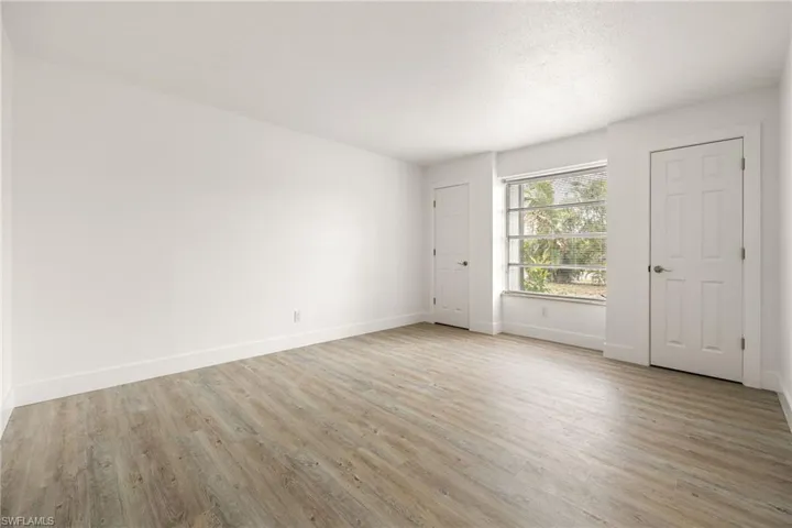 Empty room featuring light wood-style floors and baseboards