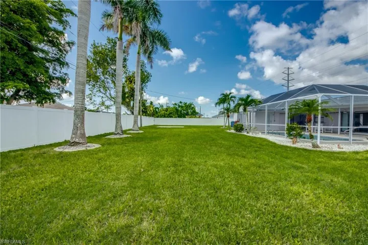 View of fenced backyard