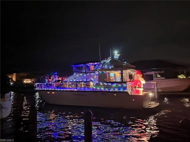 Lighted boat parade on this canal