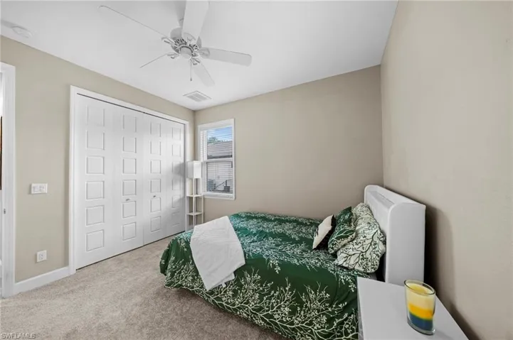 Full bathroom with walk in shower, recessed lighting, two vanities, and wood finished floors