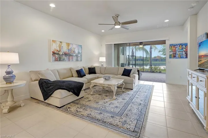 Living room with light tile patterned flooring