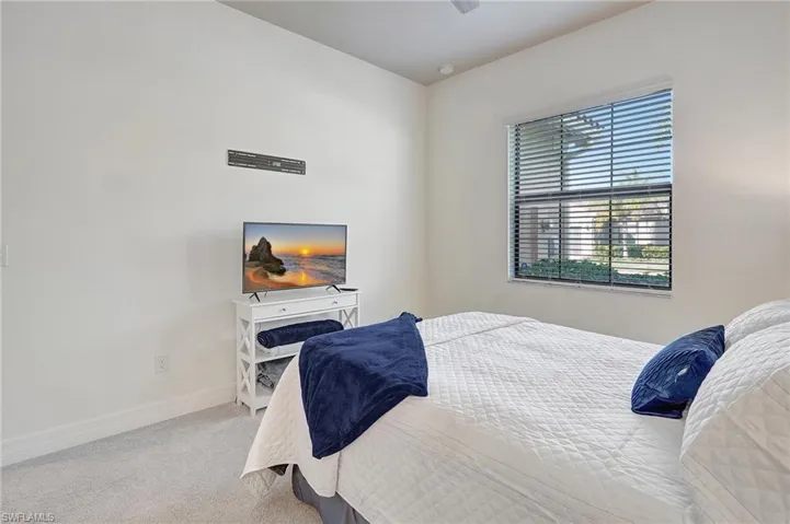 Bedroom with carpet flooring