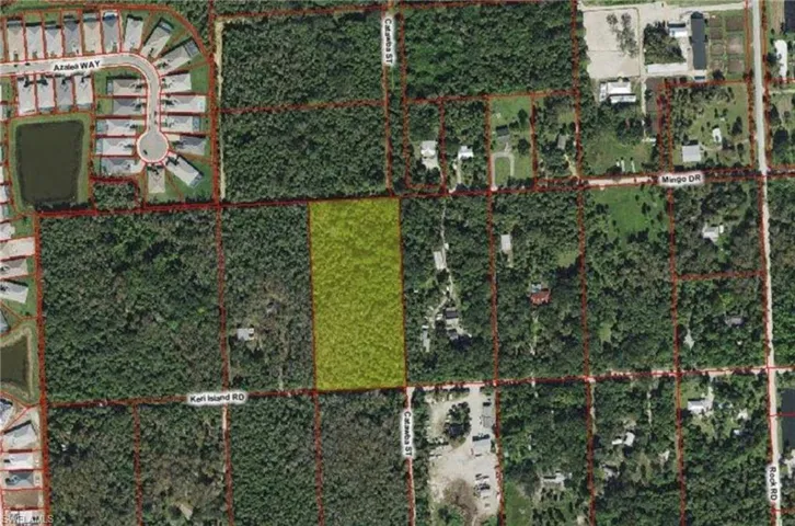 Aerial map of property and surrounding area featuring property boundaries highlighted