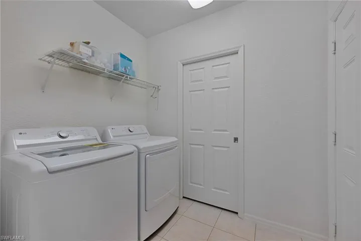 Laundry area with new LG washer and dryer, with closet for HVAC & water heater