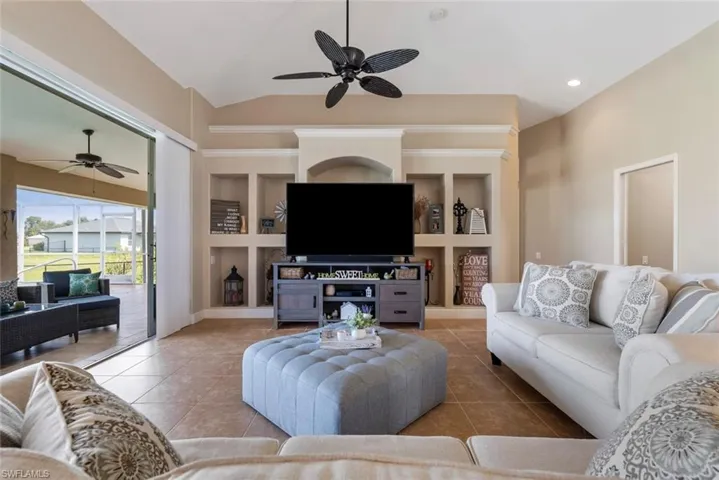 Living room with built-in entertainment center.