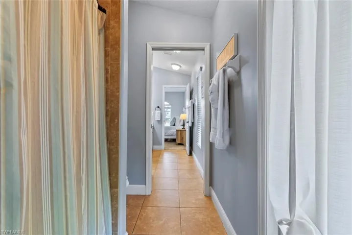 Bathroom with access to pool/lanai.