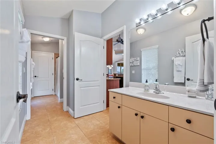 Second bathroom connects two bedrooms.