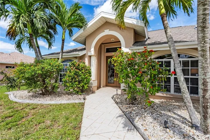 Nicely landscaped entry.