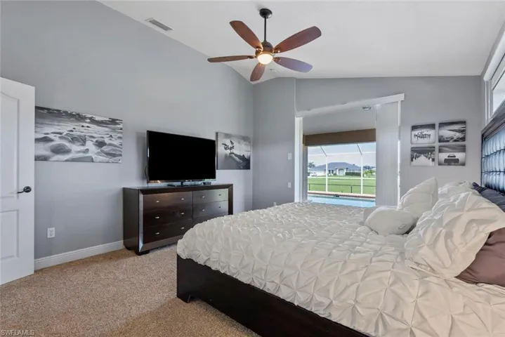 Primary bedroom with pocket sliders to lanai.