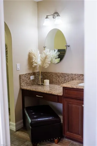 Master bathroom featuring vanity and baseboards