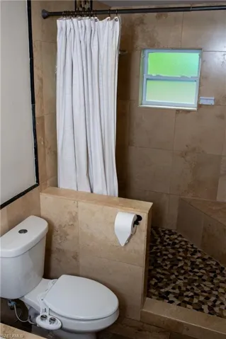 Master bathroom featuring a stall shower