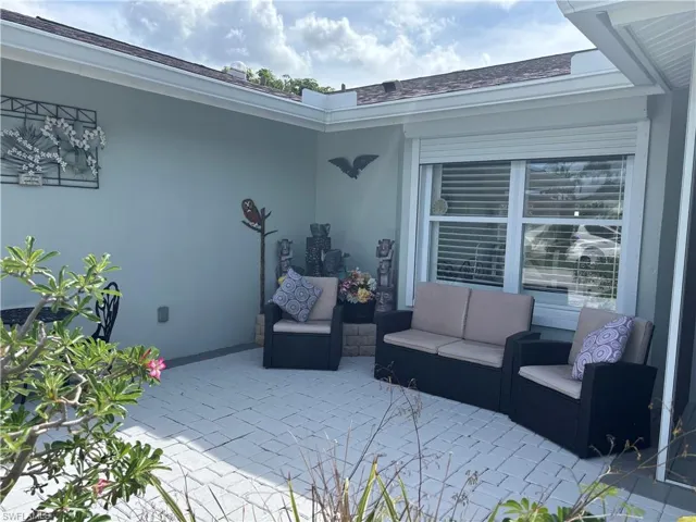 View of patio featuring an outdoor hangout area