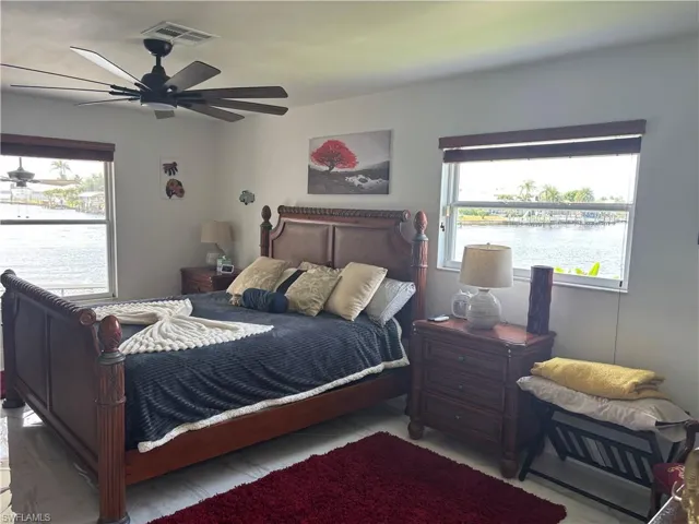 Bedroom featuring a ceiling fan