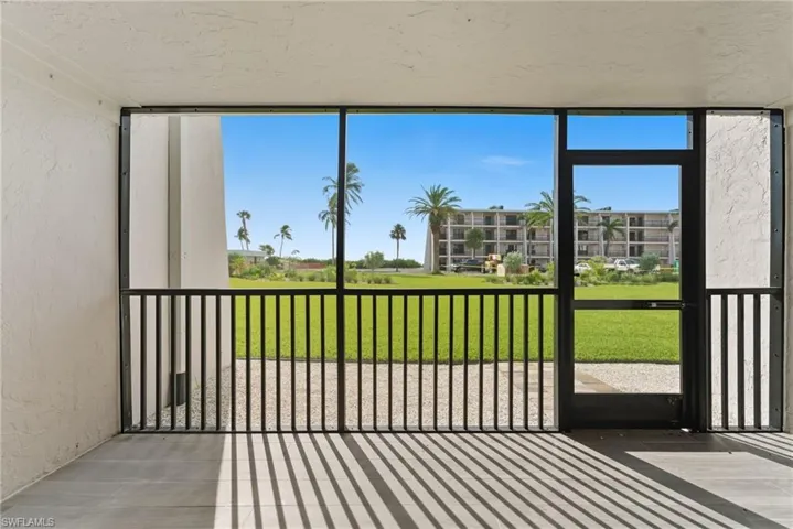 Unfurnished sunroom featuring plenty of natural light