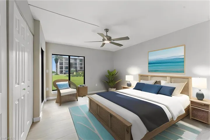 Bedroom with a closet and a ceiling fan