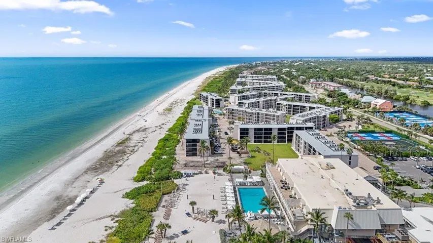 Bird's eye view of extended coastline and a pool