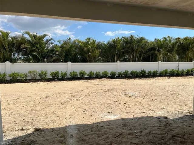Backyard view with private fencing (Not owned by homeowner ) Buyer may put additional fencing