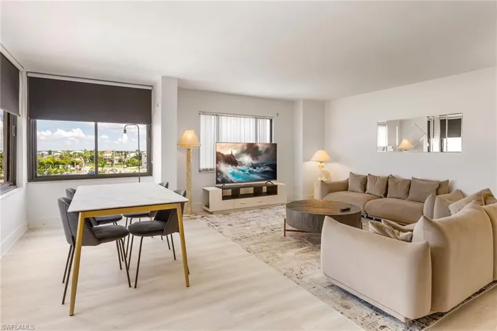 Living area featuring healthy amount of natural light and wood finished floors