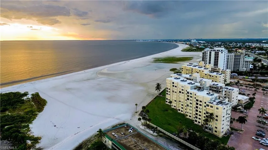 Drone / aerial view of waterfront with a beach