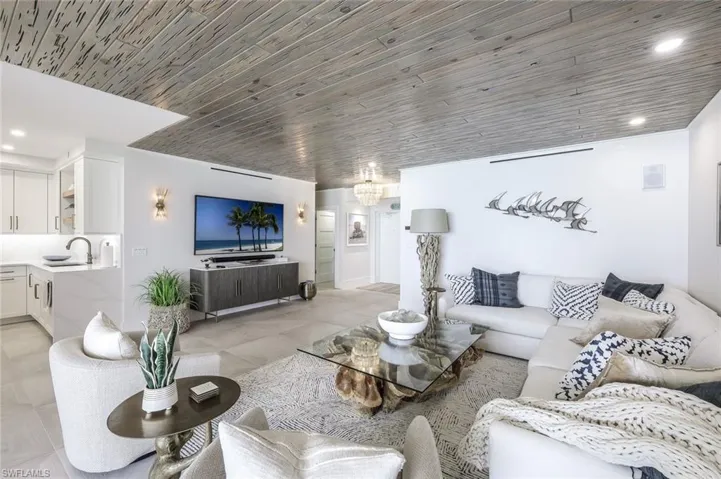 Living room featuring recessed lighting and wooden ceiling