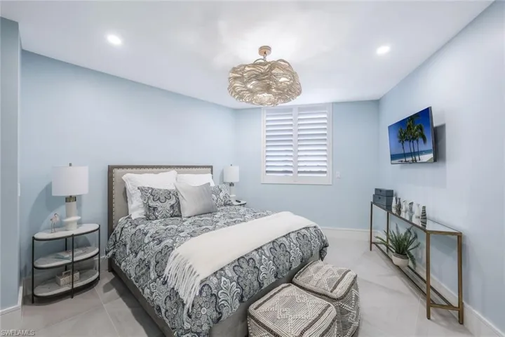 Bedroom featuring baseboards and recessed lighting