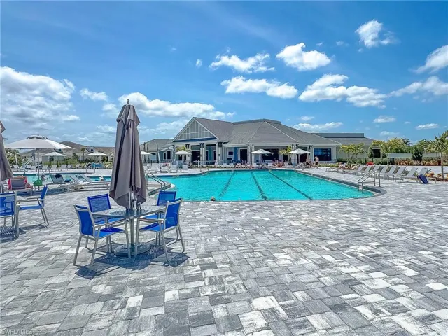 Community pool featuring a patio area
