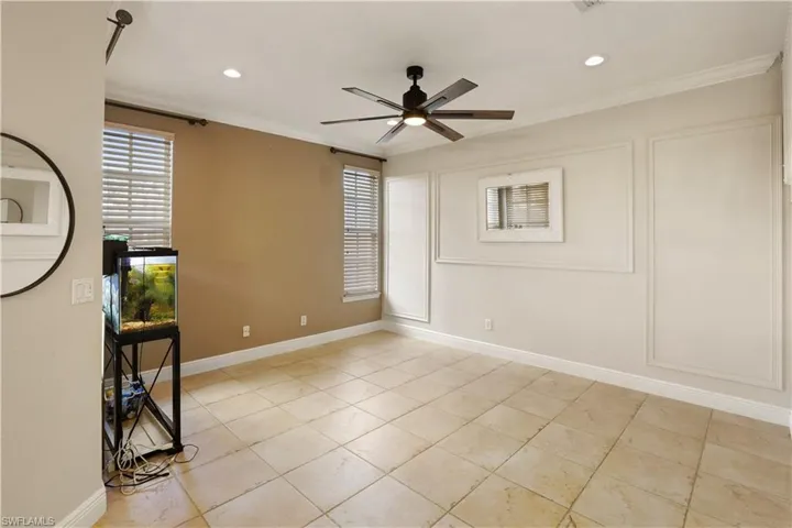 Family room featuring a ceiling fan, recessed lighting, ornamental molding, and light tile patterned floors