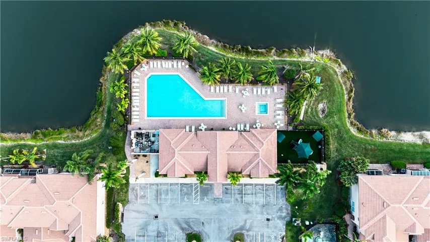 Aerial overview of property's location featuring a pool area