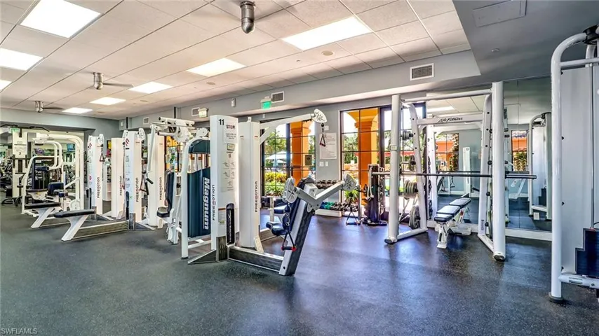 Exercise room with a paneled ceiling