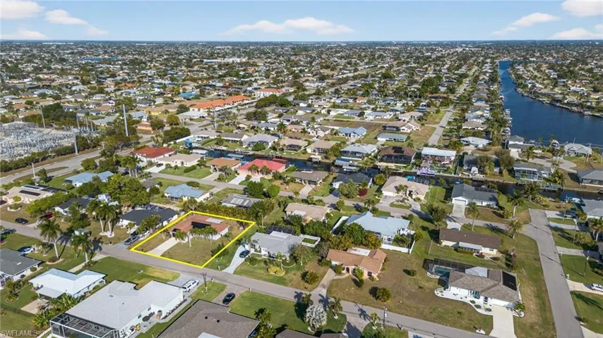 View of property location with nearby suburban area and property parcel outlined
