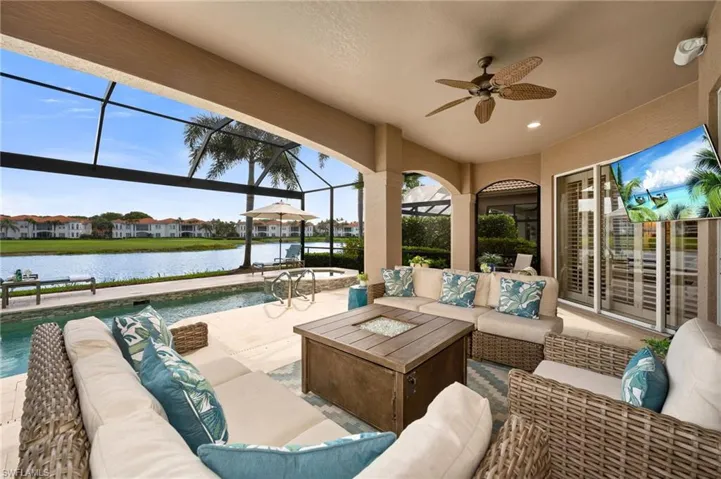 The pool and deck have been updated, with natural stone decking, and picture-window screens, which allows for the best views!