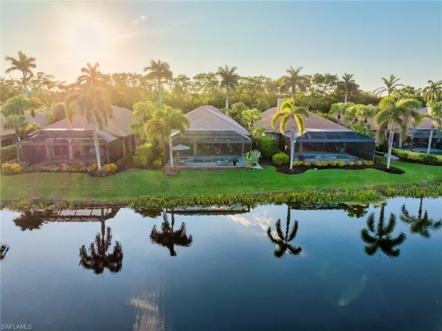 One simply has to see this home in person, to appreciate the serene views over the lake and golf course...