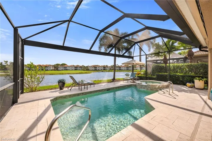 The pool/spa and deck have been updated, with picture-window screen added in 2018 for truly amazing views of the 8th Fairway of the Palm Course.