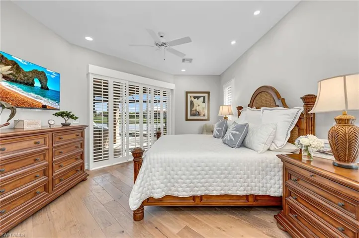 he Primary Suite has shutters and sliding glass doors, beautiful engineered European Oak floors, and incredible views to your outside paradise.