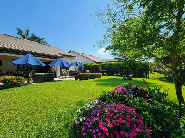 View of large, private backyard with a extended paver patio.  Mature shades trees with lots of wildlife.  Need a pool? Plenty of room for you to customize a pool of your dreams in the huge backyard.