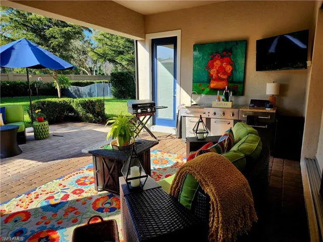 View of screened and covered patio.  Already equipped with plumbing and natural gas hook-up.