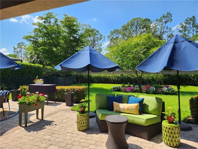 Extended paver patio situated on a large, private backyard.  Need a pool?  There is plenty of room to customize one of your dreams!