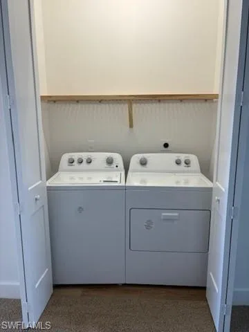 Laundry area featuring independent washer and dryer