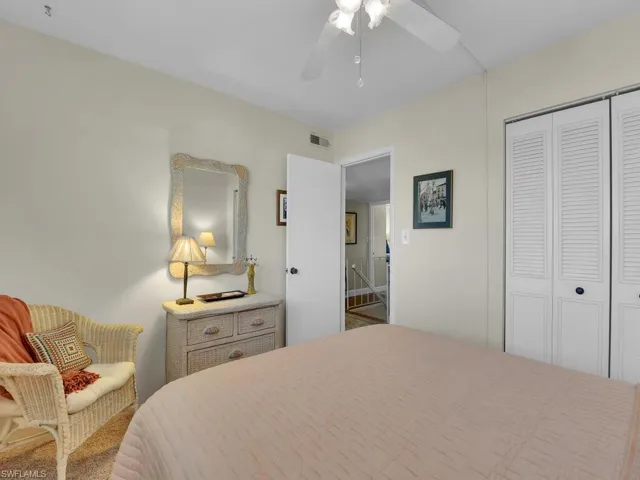 Bedroom with a closet and ceiling fan