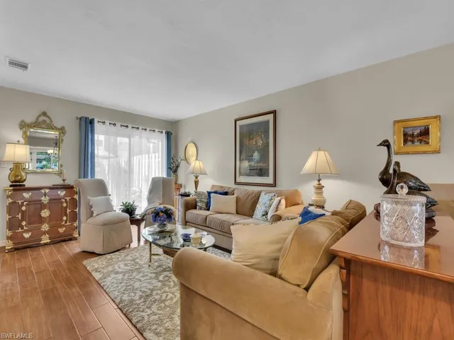 Living area featuring wood finished floors