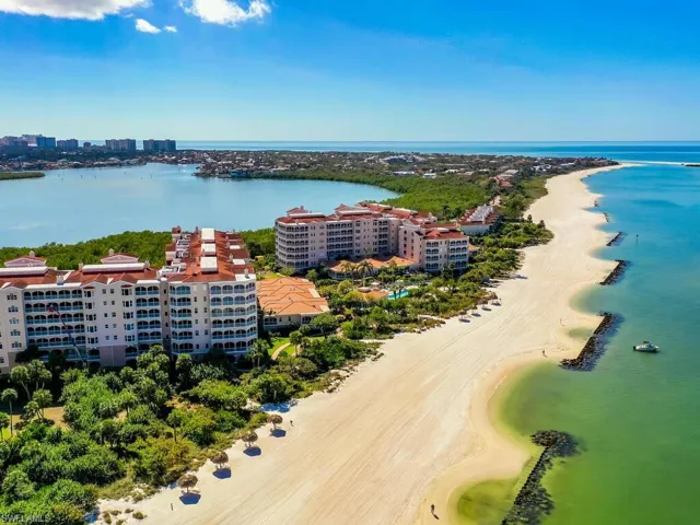 Aerial view with a view of the beach and a water view