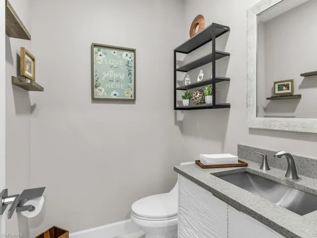 Bathroom with vanity and toilet
