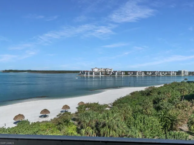 View of water feature with a beach view