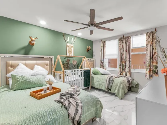 Bedroom featuring ceiling fan