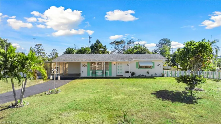 110 W Jasmine  RD, Lehigh Acres, FL 33936