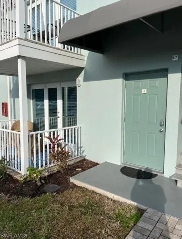 Entrance to property with french doors and stucco siding