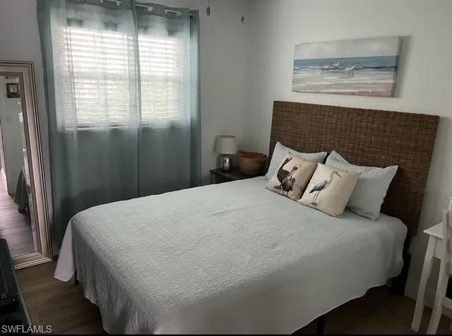 Bedroom featuring wood finished floors