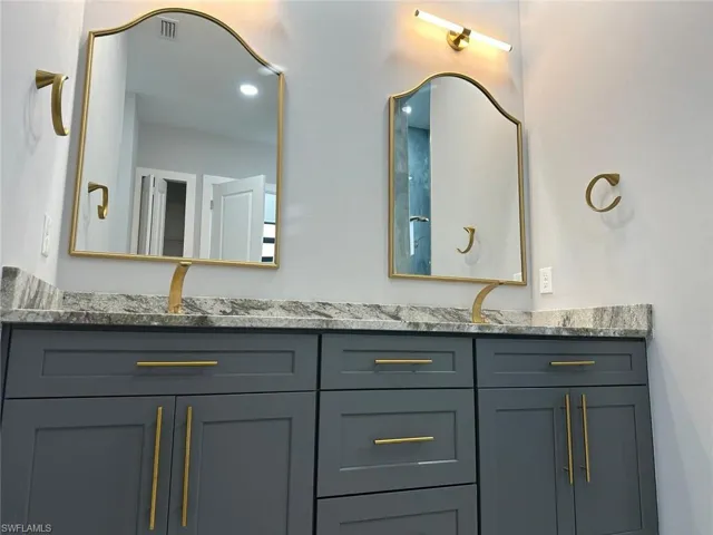 Bathroom featuring double sink vanity