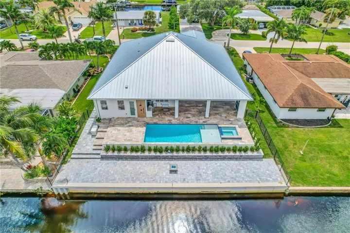 Aerial view of residential area with a pool
