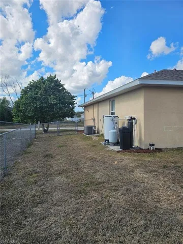 View of yard with a gate